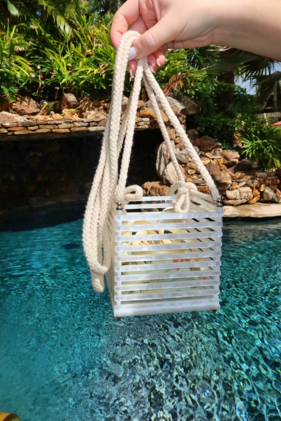 White with floral pouch